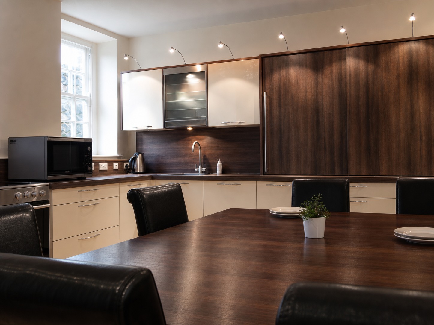 Open-plan kitchen and large dining table